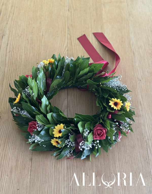 Corona di Alloro per Laurea con piccoli Girasoli, Roselline rosse e Velo da sposa sbiancato, fiocco bordeaux